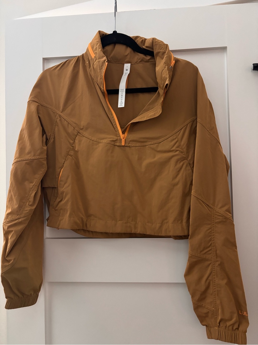 lululemon athletica Cropped Rain Jacket in Mustard with Orange Trim